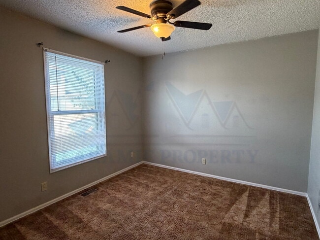 Building Photo - Single-Level 3-Bedroom Townhome with Primary Suite & Attached Garage
