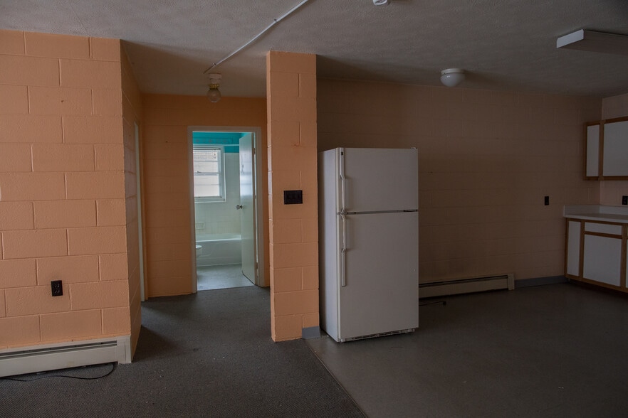 Kitchen with hallway to bedrooms - 1399 North Carolina Hwy 105 Bypass