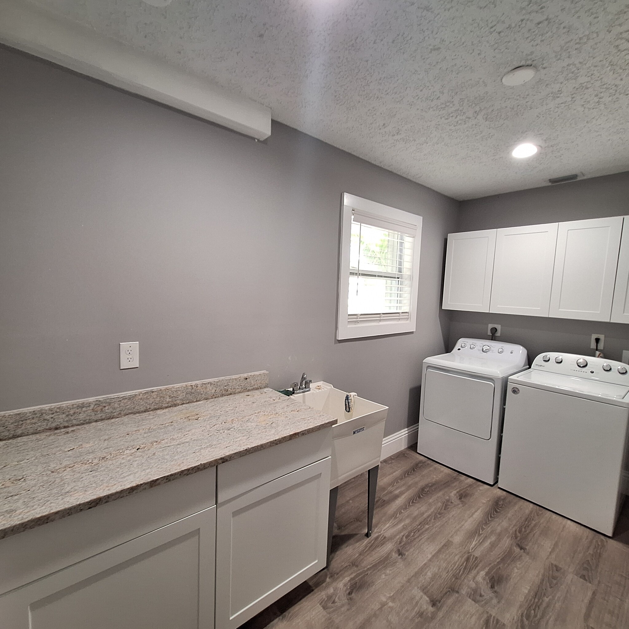 Laundry onsite with folding counter - 171 NE Caprona Ave