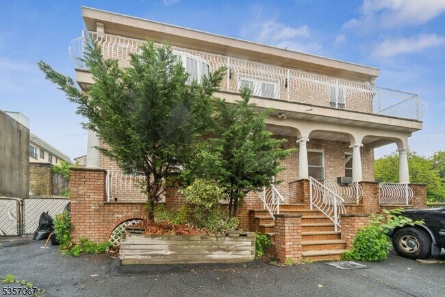 Building Photo - 310 Paterson Plank Rd