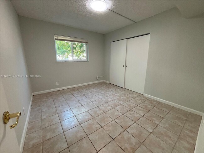 Building Photo - 7921 NW 44th Ct