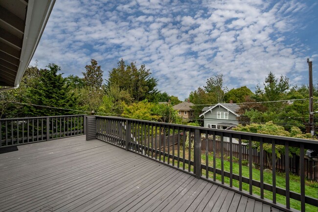 Building Photo - Traditional Four-Corner Craftsman Home on ...