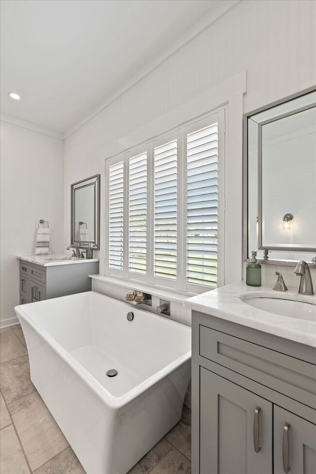 Building Photo - unning custom-built home on a full acre in...