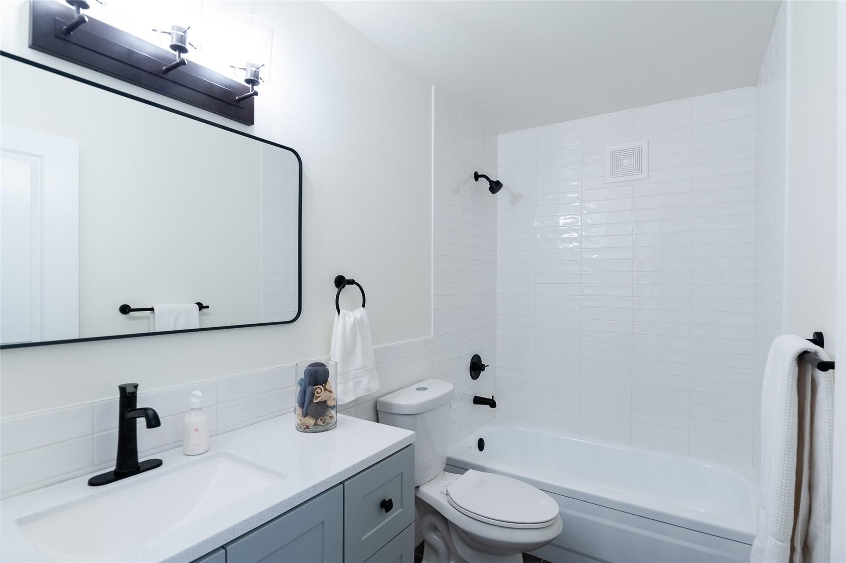 Remodeled hall bath - 600 S Clinton St