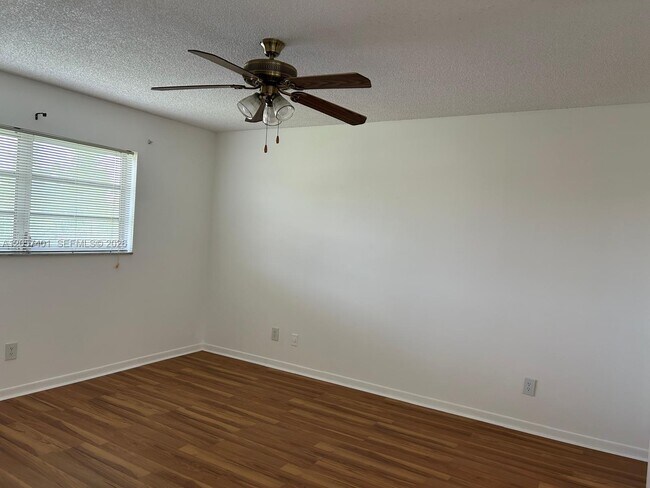 Building Photo - 6090 NW 64th Ave