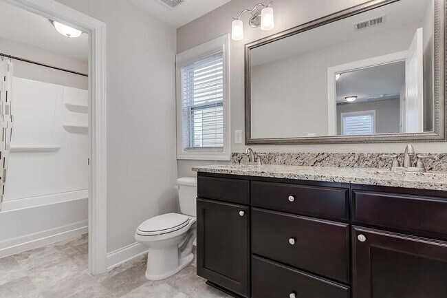 Building Photo - Like-new home located at the heart of the ...