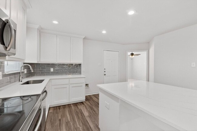 Building Photo - Bright Corner Lot Home with Open Living and Island Kitchen