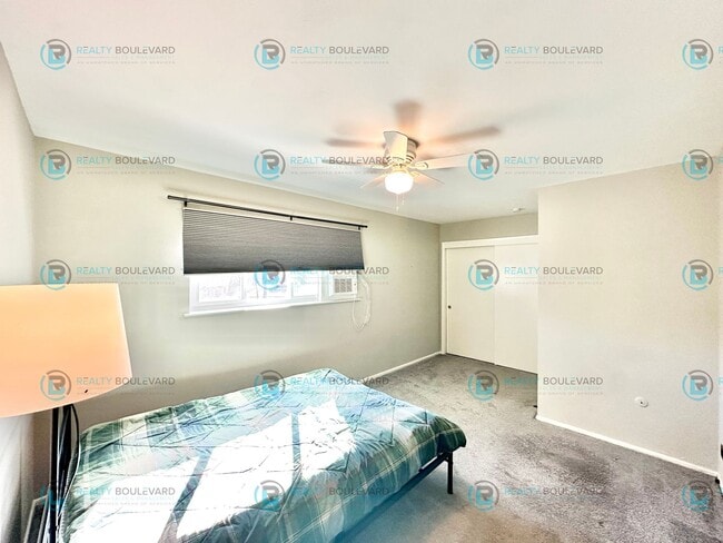 Building Photo - 2-bed, 2-bath, 2-story townhome with pool and park like setting outside the front door.