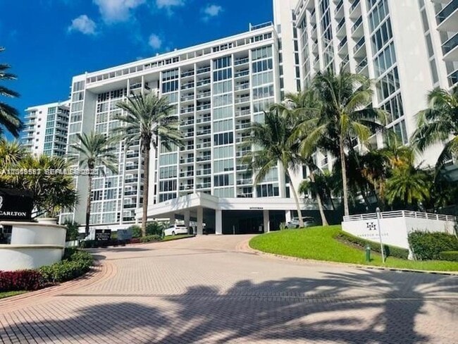 Building Photo - 10275 Collins Ave
