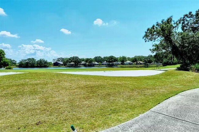 Building Photo - AVAILABLE JULY 1ST! Water & Golf Views in University Park Country Club with Pool and Spa!  3bed |...