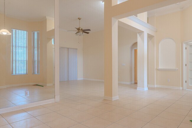 Building Photo - Spacious 5BR Home in Falcon Trace | 3-Car Garage | Screened Patio | Resort-Style Amenities Rent: ...