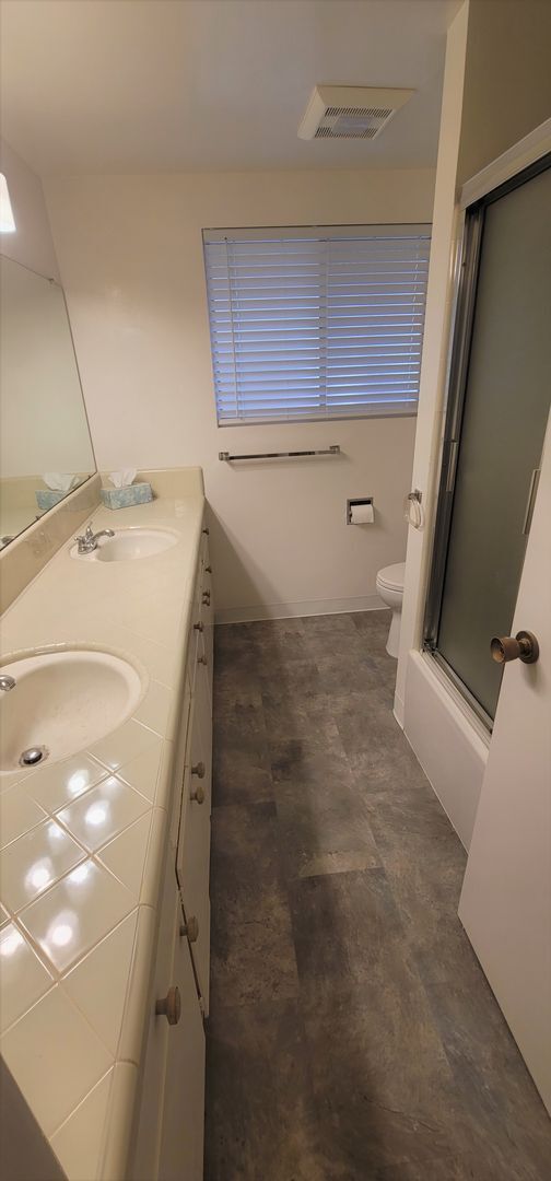 Building Photo - Classic, Midcentury 3 bedroom with Den, 2.5 bath home nestled into hillside with secluded backyar...