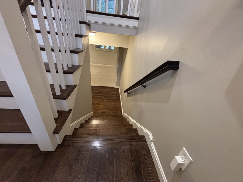 View into basement level from entry foyer - 6 Goldfinch Ln