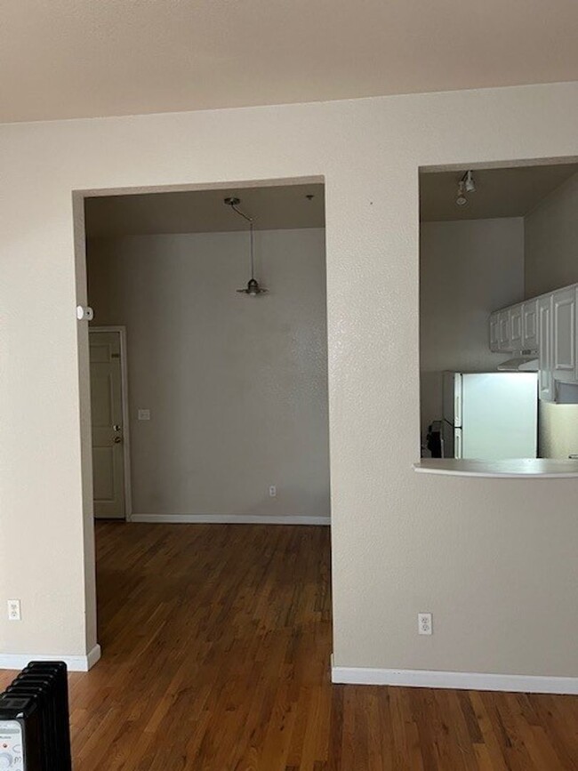 Building Photo - Large windows and exposed brick wall