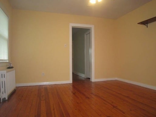 Building Photo - Wood floors, fresh paint, coin laundry, shared yard