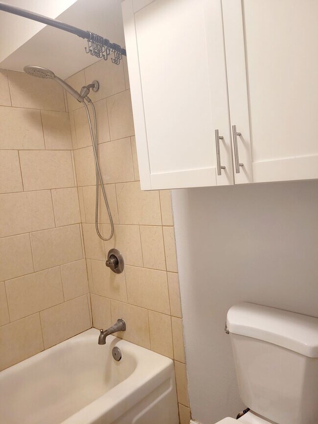 Building Photo - AVAILABLE | 2 Bedroom, 1 Bathroom Condo with 1 Assigned Parking Stall