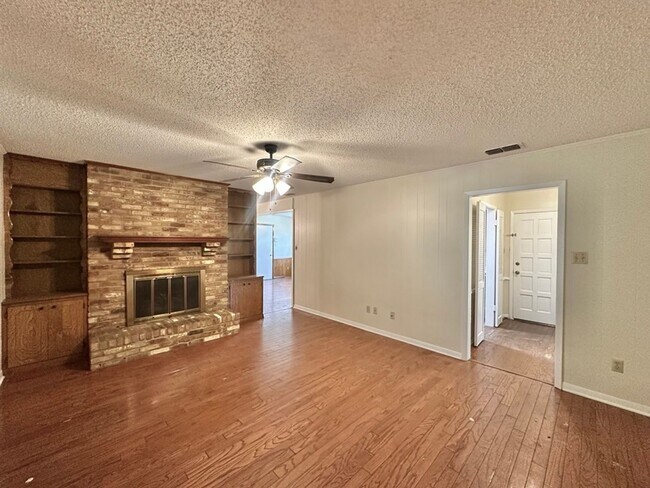 Building Photo - Spacious 4-Bedroom Home on a Corner Lot wi...