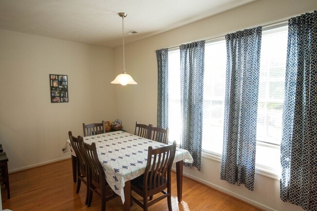Building Photo - End Unit Townhouse With Garage and Unfinis...