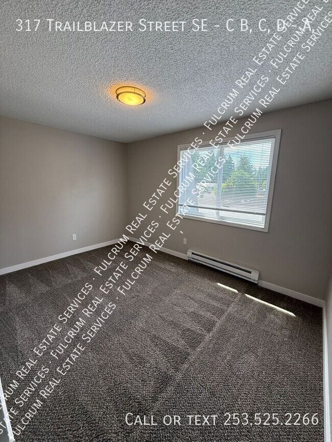 Building Photo - 317 Trailblazer St SE