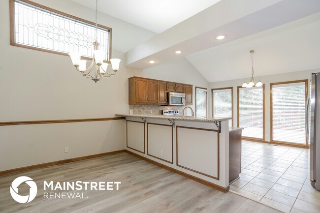 Building Photo - 5203 Woodsonia Dr