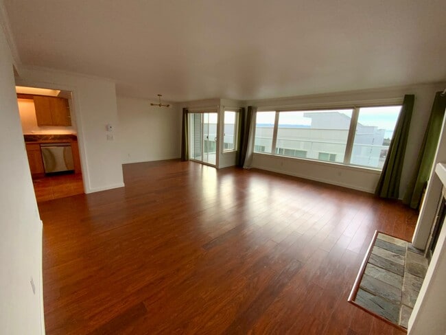 Building Photo - 1,300+ Sq Ft 2BR Condo w/ Parking, W/D & Utilities Included | $1,000 Move-In Credit