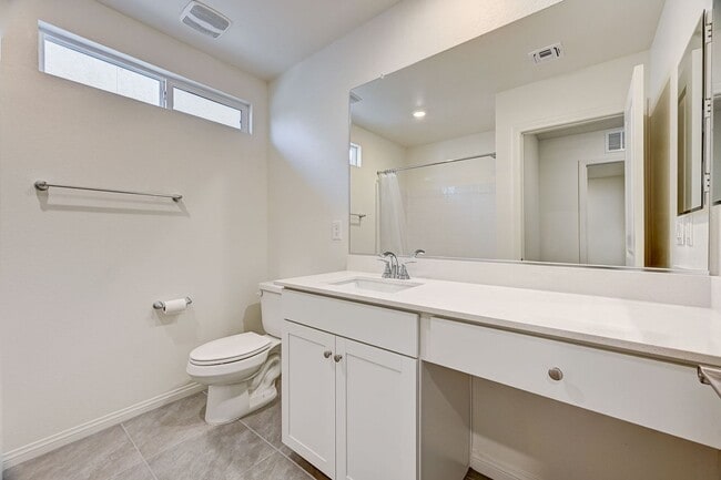Building Photo - Beautiful two-story rental home featuring 4 bedrooms, 3 bathrooms, and a 2-car garage.