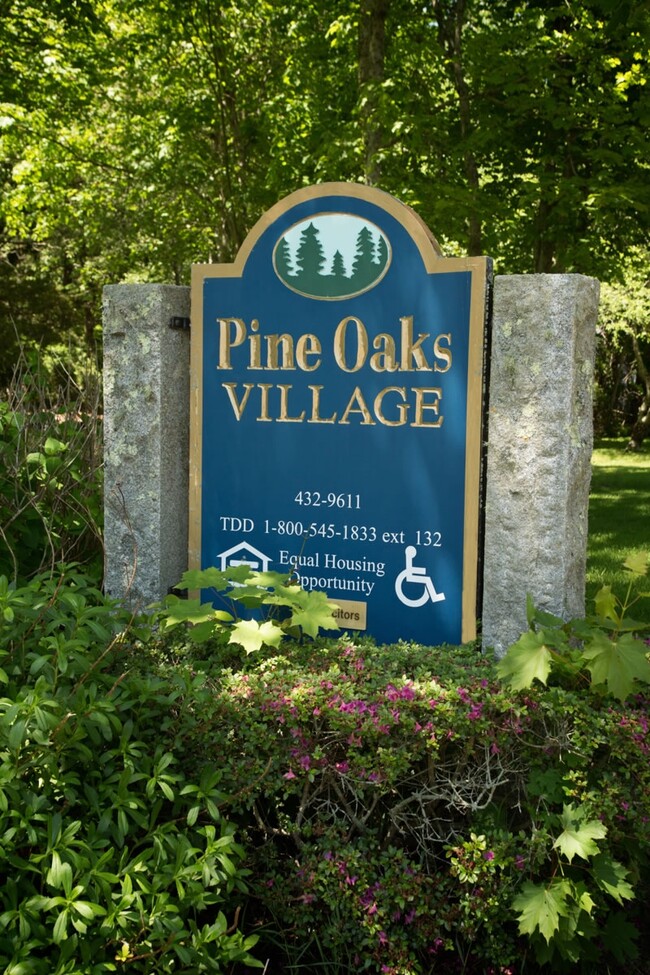 Primary Photo - Pine Oaks Village Apartments