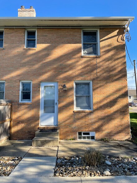 Backdoor to available unit - 8451 Pleasantwood Ave NW