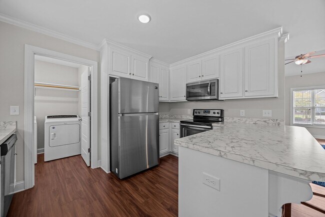 Building Photo - Three-bedroom, two-bathroom home located i...