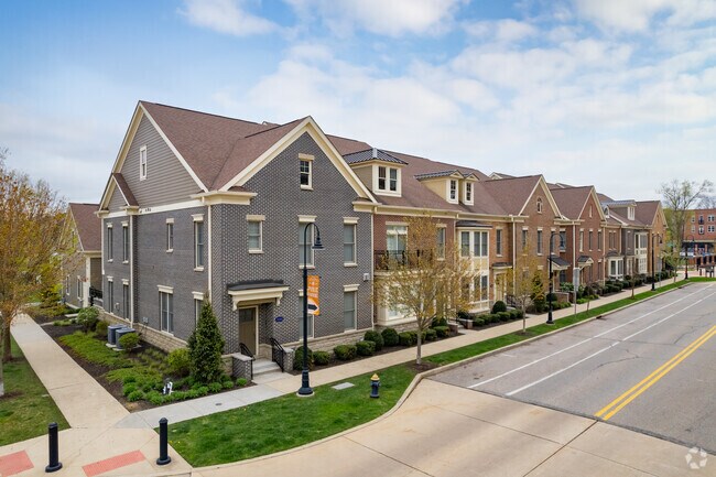 Primary Photo - Triumph Court Townhomes
