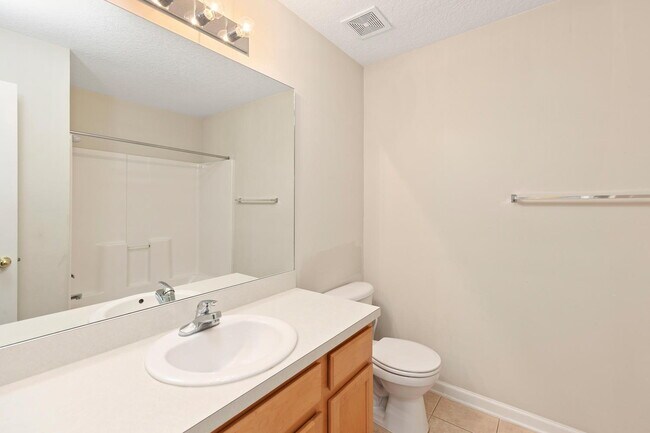 Building Photo - Beautifully Updated & Spacious 3BR/2BA Condo in a Secure Gated Community — Includes Cable, Intern...