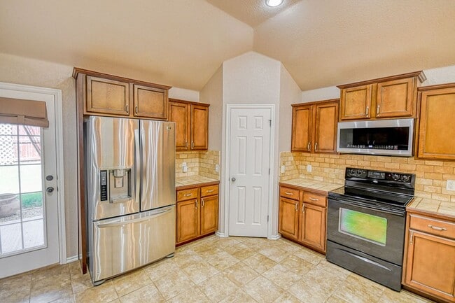 Building Photo - Beautiful three bedroom home with in-ground storm shelter!
