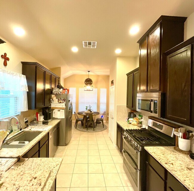 Building Photo - *COMING SOON* Modern Home with Fenced Backyard, Community Pool & Playground!