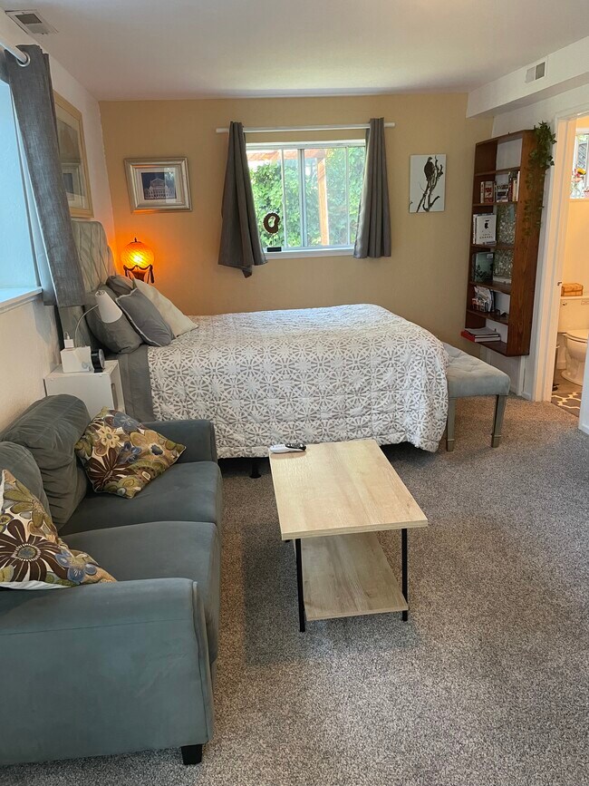 BR#1 with couch, table, new carpet - 27 Graceland Dr