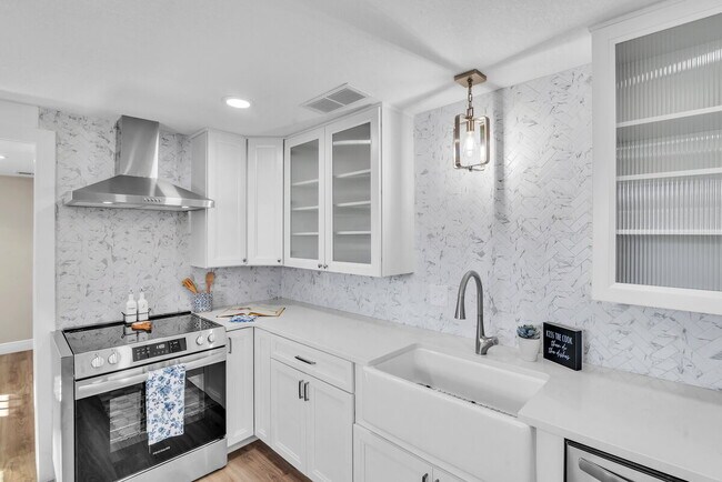 Building Photo - A spacious 3-bedroom, 2-bath layout provides plenty of room for family and guests!