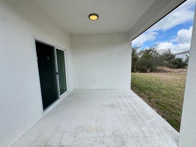 Building Photo - Spacious 4-Bedroom Home in Poinciana – Internet Included & No HOA Approval Required