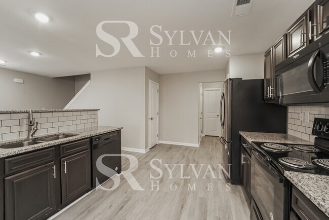 Building Photo - Come view this charming home