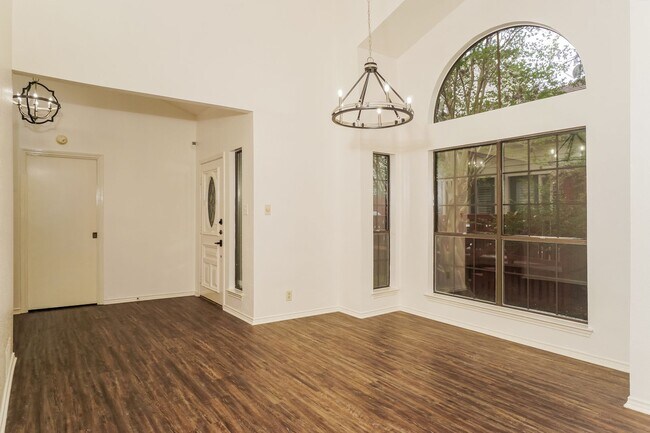 Building Photo - Charming 2-Bedroom Condo in Gated Community Surrounded by Mature Trees