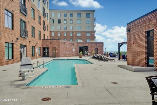 Building Photo - Welcome to your dream condo in the heart o...