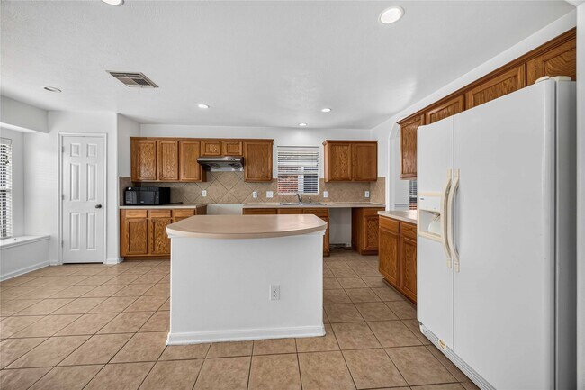 Building Photo - 12807 Canyon Echo Dr