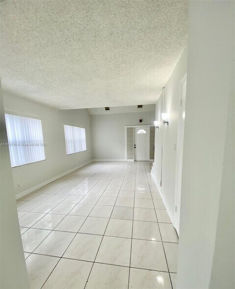 Building Photo - 3200 Coral Springs Dr