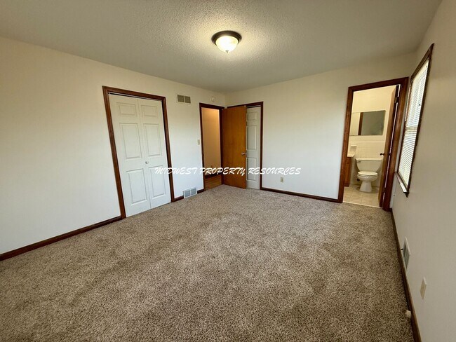 Building Photo - Spacious 3 Bedroom Home with Finished Lower Level & Large Fenced Yard