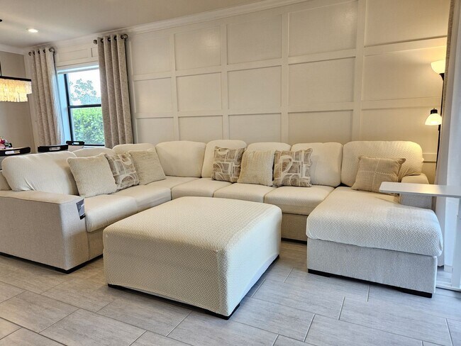 Building Photo - Stunning Model Home – 2 Bedrooms plus Den,...