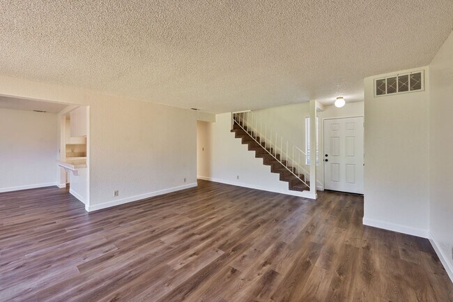 Building Photo - 3 Bedroom Home with Fireplace and LVP Flooring & 2-Car Garage!