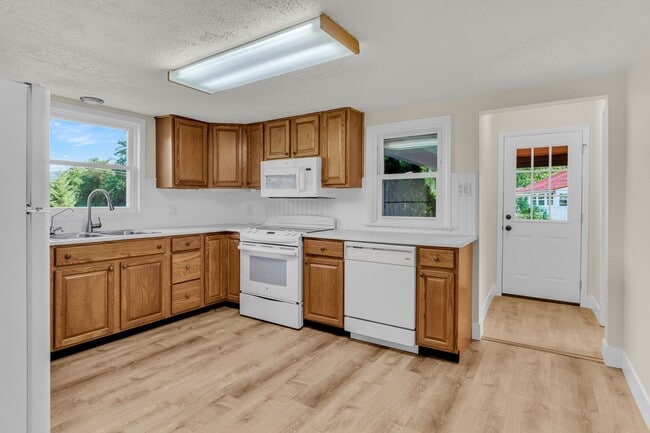 Building Photo - Creekside Charm: Your Dream, 1 of a kind, ...