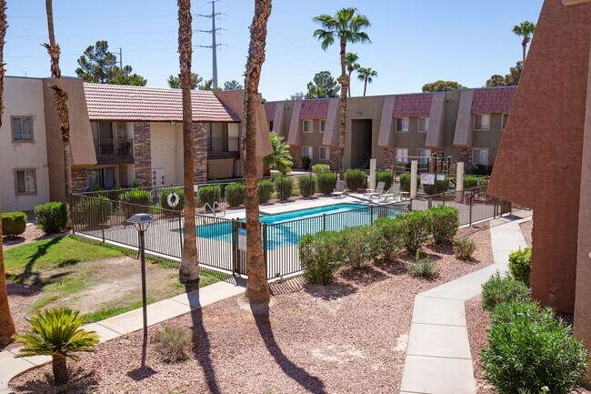Building Photo - 2nd floor unit in upscale guard gated SW complex near Strip