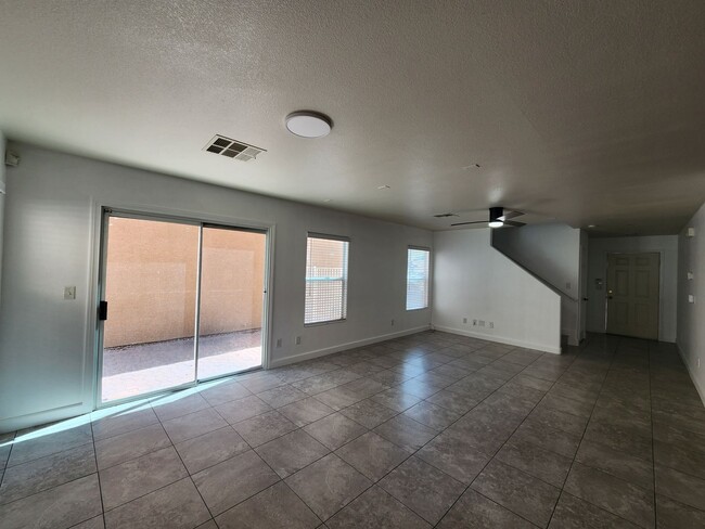 Building Photo - Sleek 2 story home with tile in most living areas and upgraded kitchen.