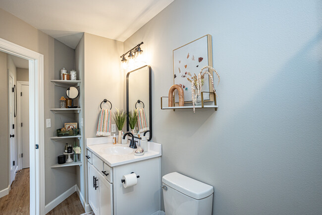 Second full bathroom featuring shower/tub combo and luxury vanity with additional vanity - 110 Sierra Cir