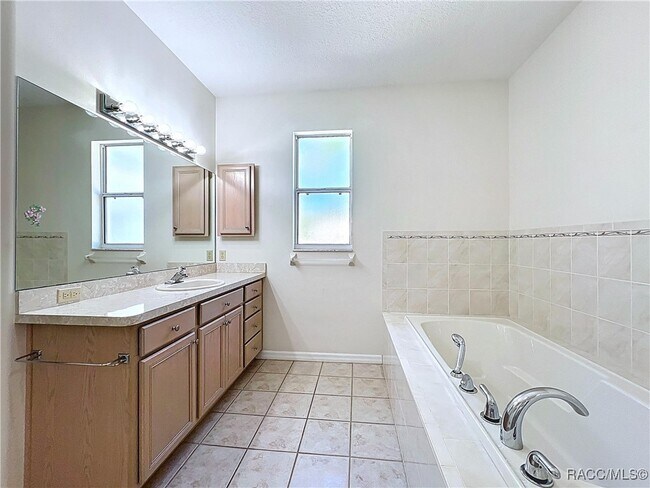 Building Photo - 5950 N Petunia Terrace