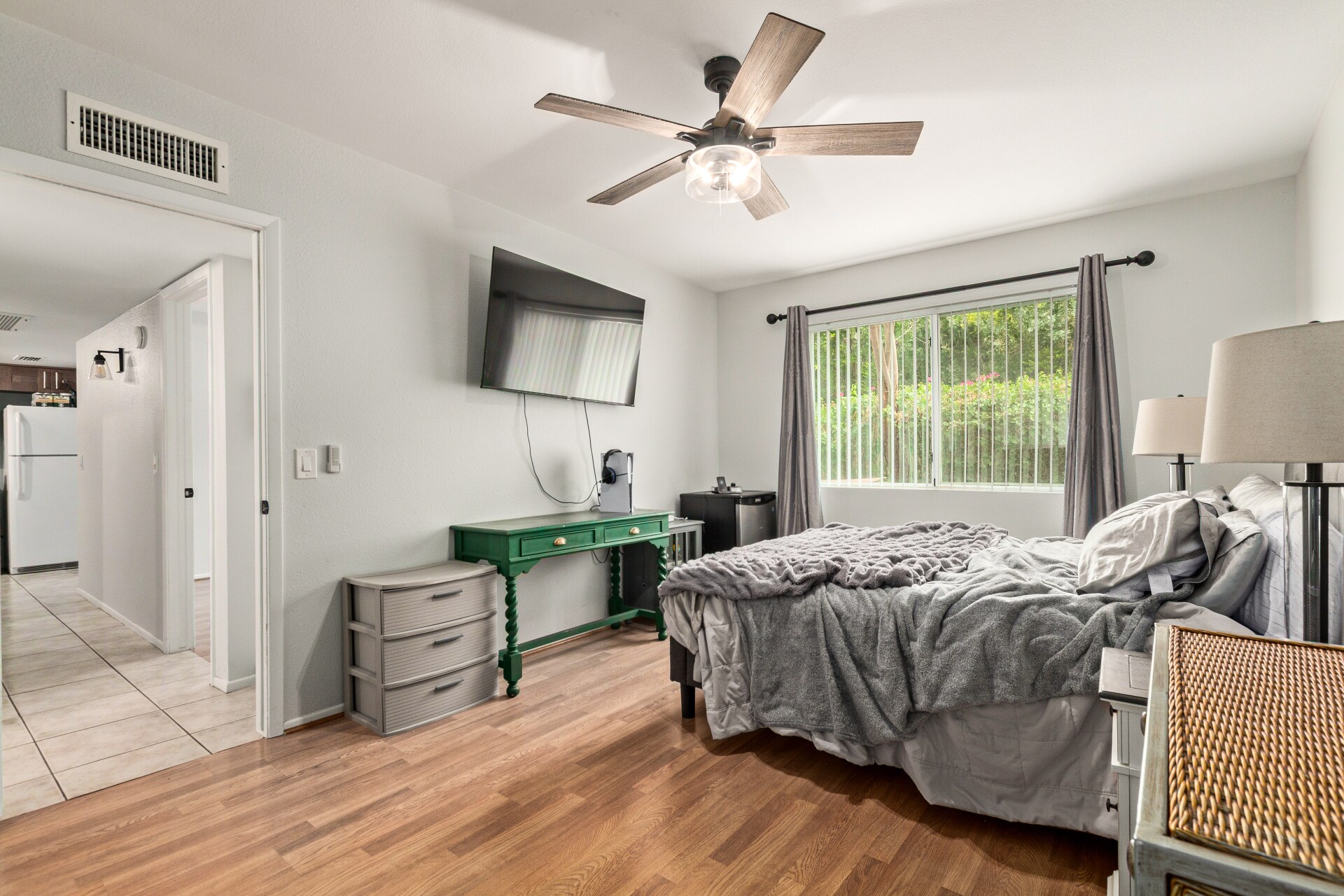 Primary bedroom with hallway view - 115 W 10th St